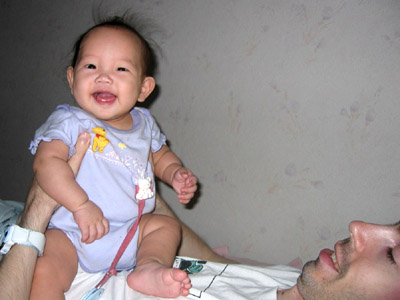 Playing on Dad's chest